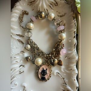 Charming Gold and Pink Cat Pendant Bracelet Betsy Johnson charm bracelet signed